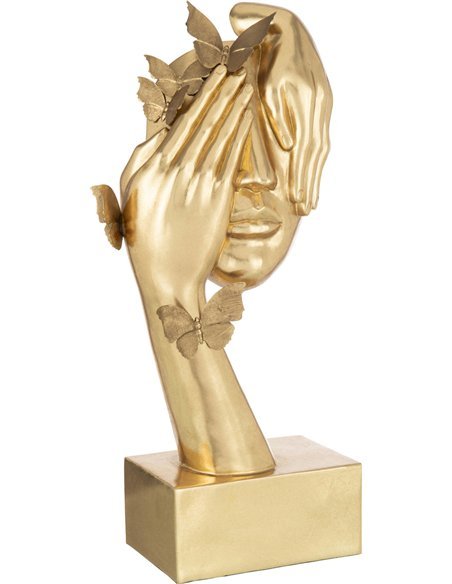 sculpture visage doré avec papillons décoration élégante