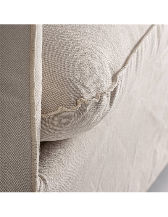 Canapé confortable en lin beige ambiance chaleureuse et chic