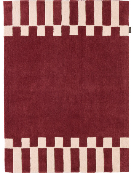 tapis rouge chaleureux motif graphique fait main pour maison