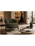 Fauteuil lounge en tissu vert avec piètement bois