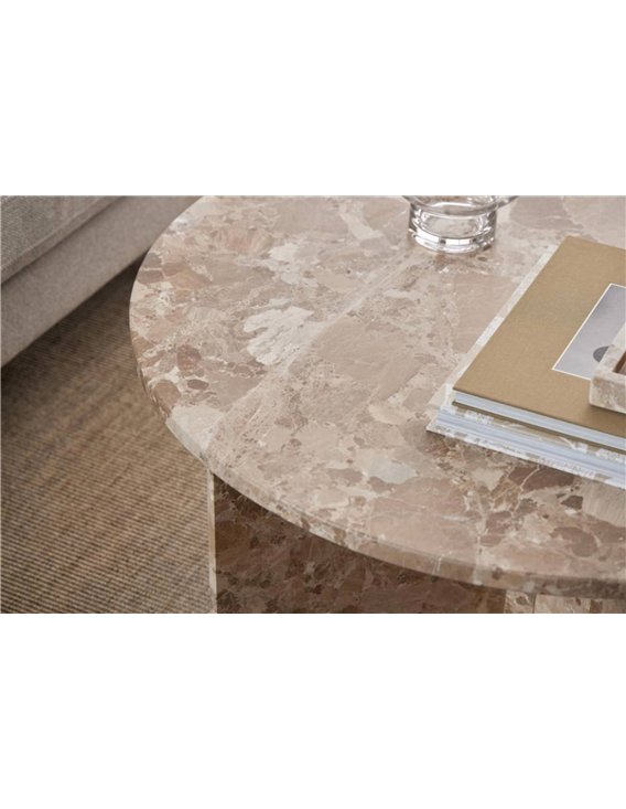 Table basse beige à piètement sculptural