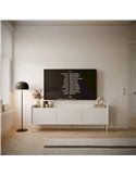 Meuble TV scandinave blanc contre un mur clair avec téléviseur et lampadaire
