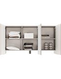 Buffet trois portes arquées beige ouvert, étagères garnies de linge et de livres