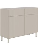 Commode rainurée beige sur pieds fins vue de trois quarts