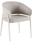 Chaise tapissée enveloppante beige crème, vue de trois quarts avec pieds blancs