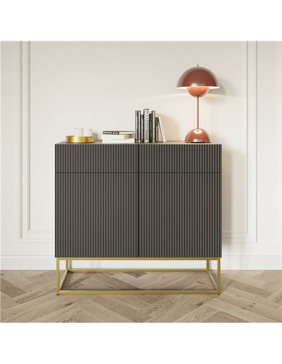 Buffet anthracite rainuré décoré de livres et d'une lampe rouge