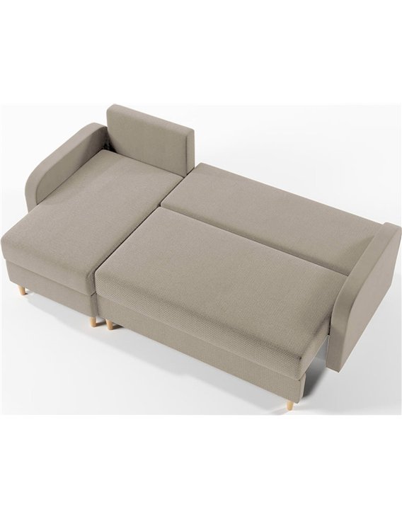 Vue de dessus du canapé d'angle beige en position couchage, assise dépliée