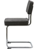 Chaise tapissée au design Bauhaus, vue de profil montrant le piètement cantilever