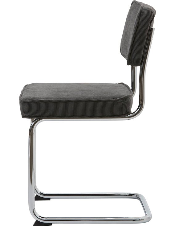 Chaise tapissée au design Bauhaus, vue de profil montrant le piètement cantilever