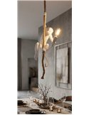 Luminaire singe tenant une ampoule