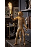 Lampe singe tenant une ampoule