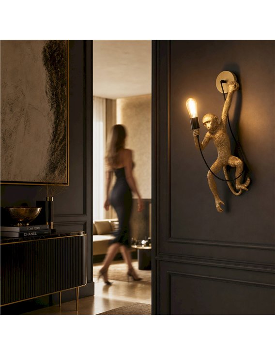 Lampe murale singe en résine dorée