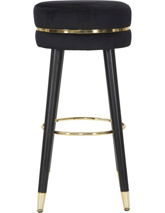 Tabouret de bar rond noir en mise en situation devant un comptoir en marbre
