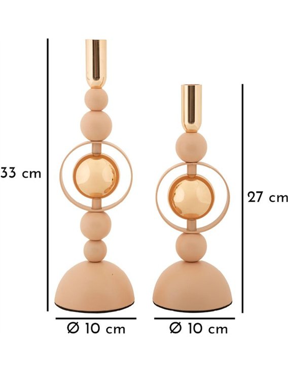 Bougeoirs en fer rosé avec bougies torsadées, mis en scène sur une console dorée