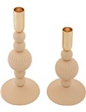 Bougeoirs beige rosé vus de face sur fond blanc, base ronde