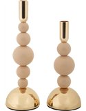Deux bougeoirs beige et doré sans bougies, vue de côté