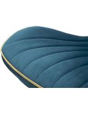 Détail du capitonnage bleu canard de l'assise avec liseré doré