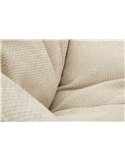 Gros plan sur la texture beige du tissu du fauteuil pivotant rétro enveloppant