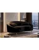 Canapé arrondi noir dans un salon avec tapis et fenêtre