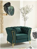 Fauteuil capitonné vert émeraude dans un intérieur lumineux avec un olivier