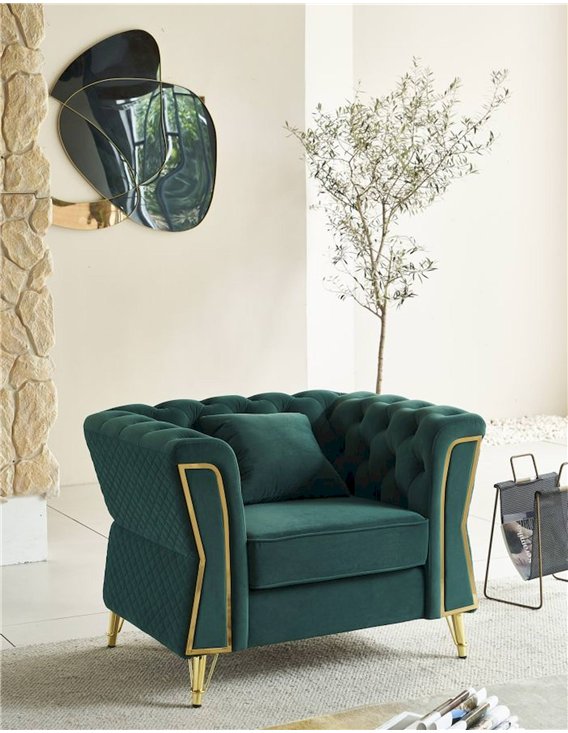 Fauteuil capitonné vert émeraude dans un intérieur lumineux avec un olivier