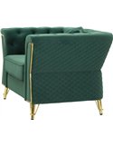 Fauteuil capitonné vert émeraude vu de trois quarts arrière, flanc matelassé