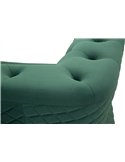 Détail de l'assise et de l'accoudoir capitonnés en velours vert