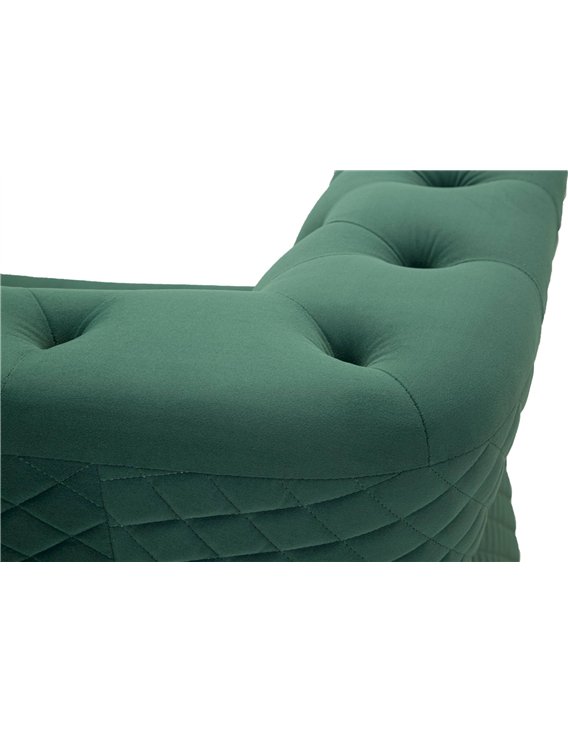 Détail de l'assise et de l'accoudoir capitonnés en velours vert