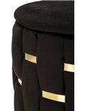 Détail rapproché du tressage noir et des bandes dorées sur le flanc d'un pouf