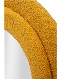 Détail du bouclé jaune moutarde sur la portion arrondie du cadre