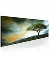 Tableau colline de malachite vert avec arbre isolé sous un ciel nuageux