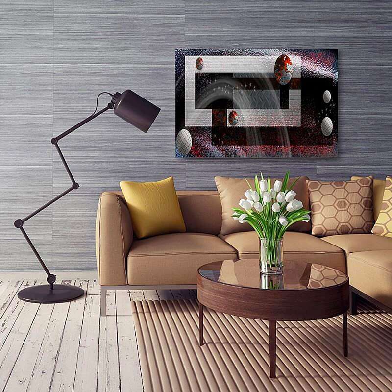 Tableau bois la composition du metal 2 accroché au-dessus d'un canapé beige dans un salon