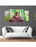 Tableau le bouddha sur fond de bambou au-dessus d'un canapé blanc, vue de face dans un salon
