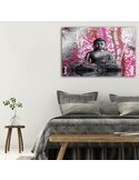 Tableau bouddha et bambou accroché au-dessus d'un lit gris dans une chambre