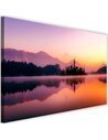 Tableau château sur un lac de montagne en tons roses et orangés