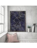 Tableau carrés d'or accroché au mur, au-dessus d'un coussin rose sur une banquette