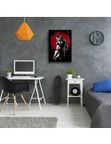 Tableau Big Boss accroché au mur d'un bureau avec lampe orange et horloge