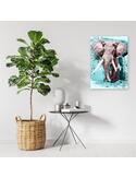 Tableau éléphant aquarelle accroché au mur près d'un grand plant et d'une table d'appoint