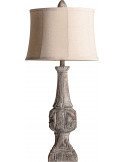Lampe de salon beige en résine au pied sculpté d'aspect vieilli