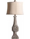 Lampe de salon beige en résine au pied sculpté d'aspect vieilli